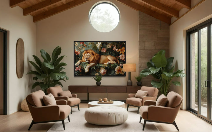 Framed canvas wall art of a lion sleeping among flowers, hung in a modern living room.