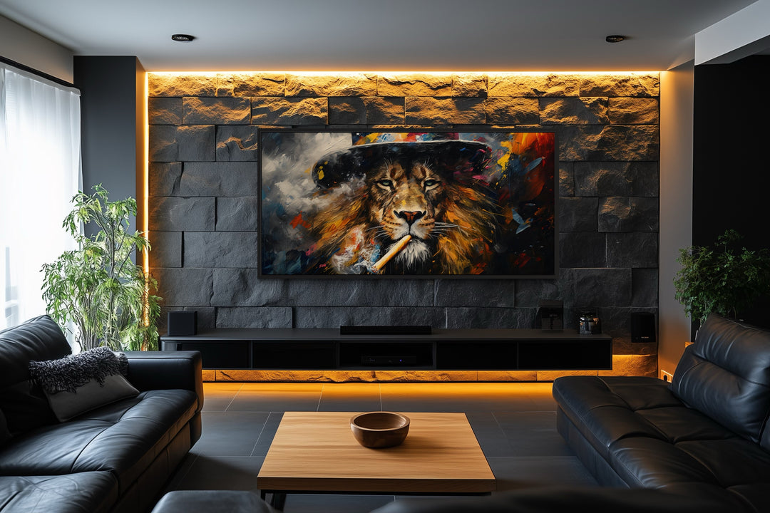 Framed canvas print of a lion smoking a cigar, mounted on a stone wall in a modern living room.