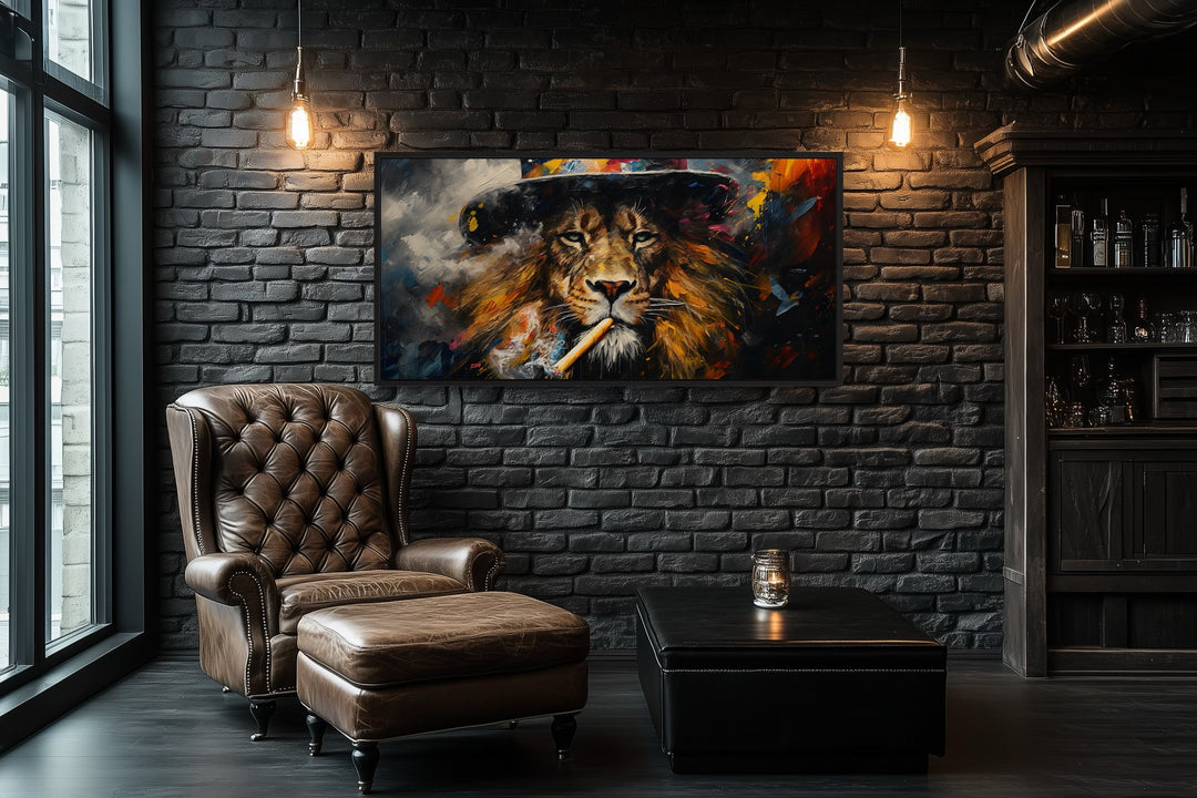 Framed canvas print of a lion smoking a cigar in a dark room with a leather chair and ottoman.