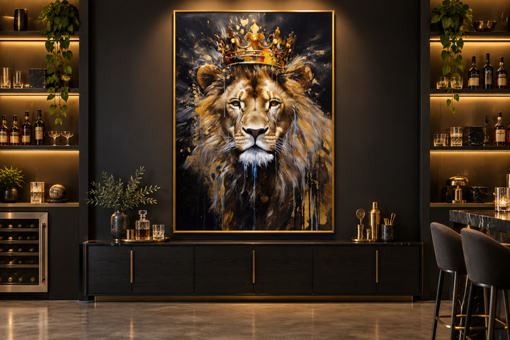 Framed canvas wall art of a lion wearing a gold crown, displayed in a modern man cave setting.