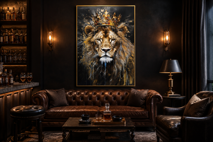 Framed canvas wall art of a lion wearing a gold crown in a dark, sophisticated man cave setting.