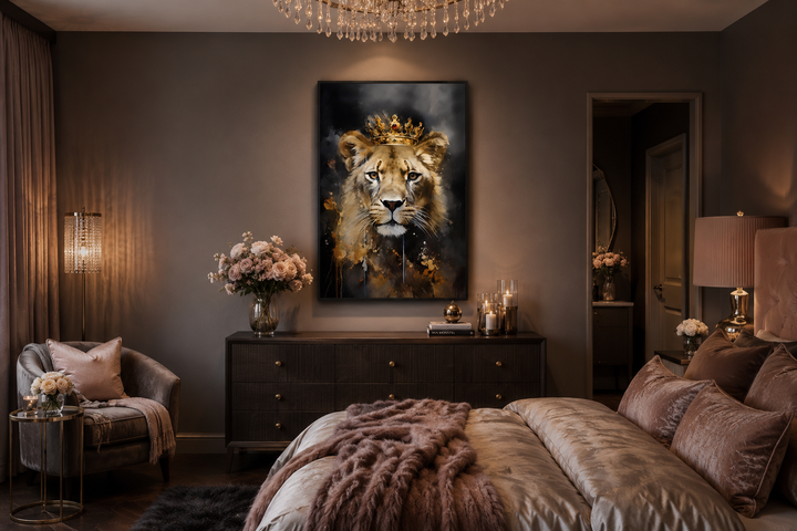 Framed canvas wall art of a lioness wearing a gold crown, hanging above a dresser in a bedroom.
