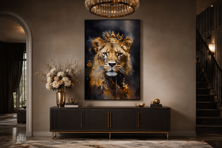Framed canvas wall art of a lioness wearing a gold crown, styled in black and gold tones.