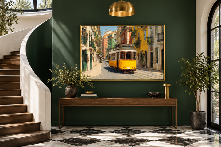Colorful Lisbon street scene canvas wall art featuring a yellow tram in a gold frame on a green wall