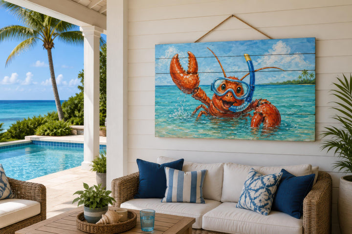 A whimsical lobster snorkeling painting on a distressed wood panel hangs in a coastal living room.