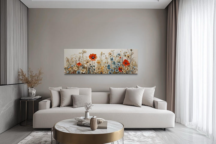 Long horizontal canvas wall art featuring a vibrant poppy and blue wildflower garden scene.