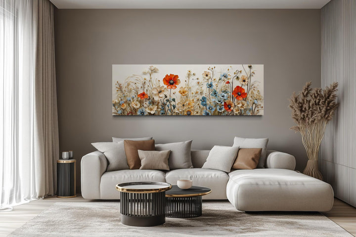 Long horizontal canvas wall art featuring a vibrant poppy and blue wildflower garden scene.