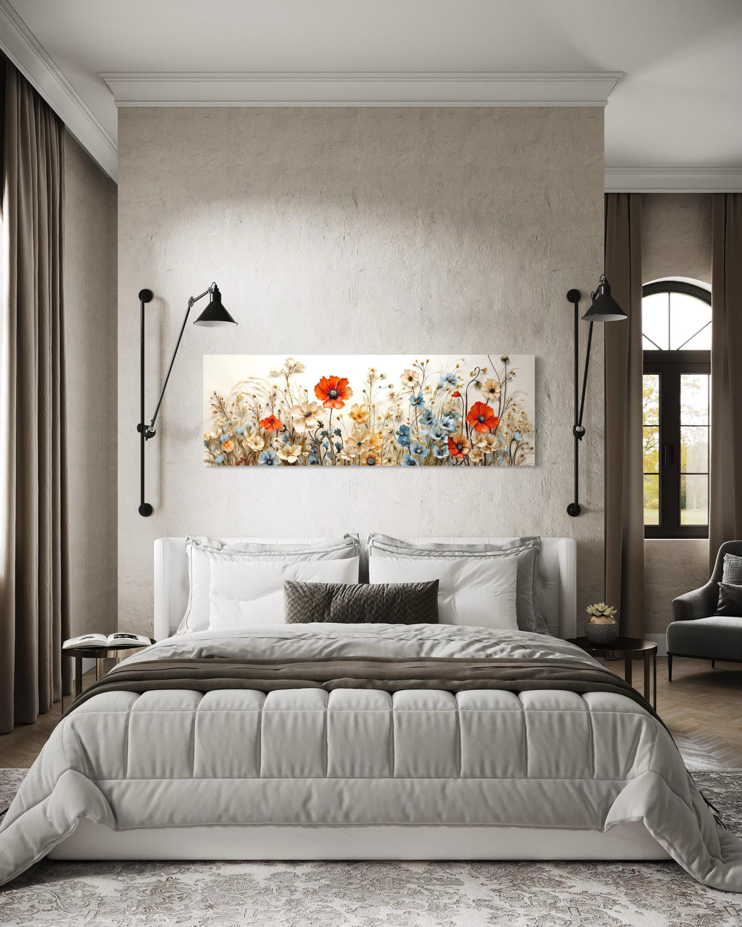 Long horizontal canvas wall art of poppies and blue flowers hanging above a bed in a modern room.
