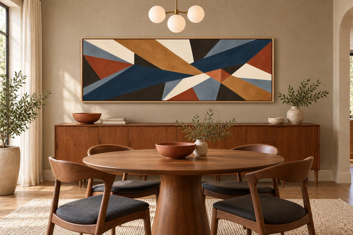 Long horizontal mid-century modern abstract canvas art with geometric shapes in earth tones.