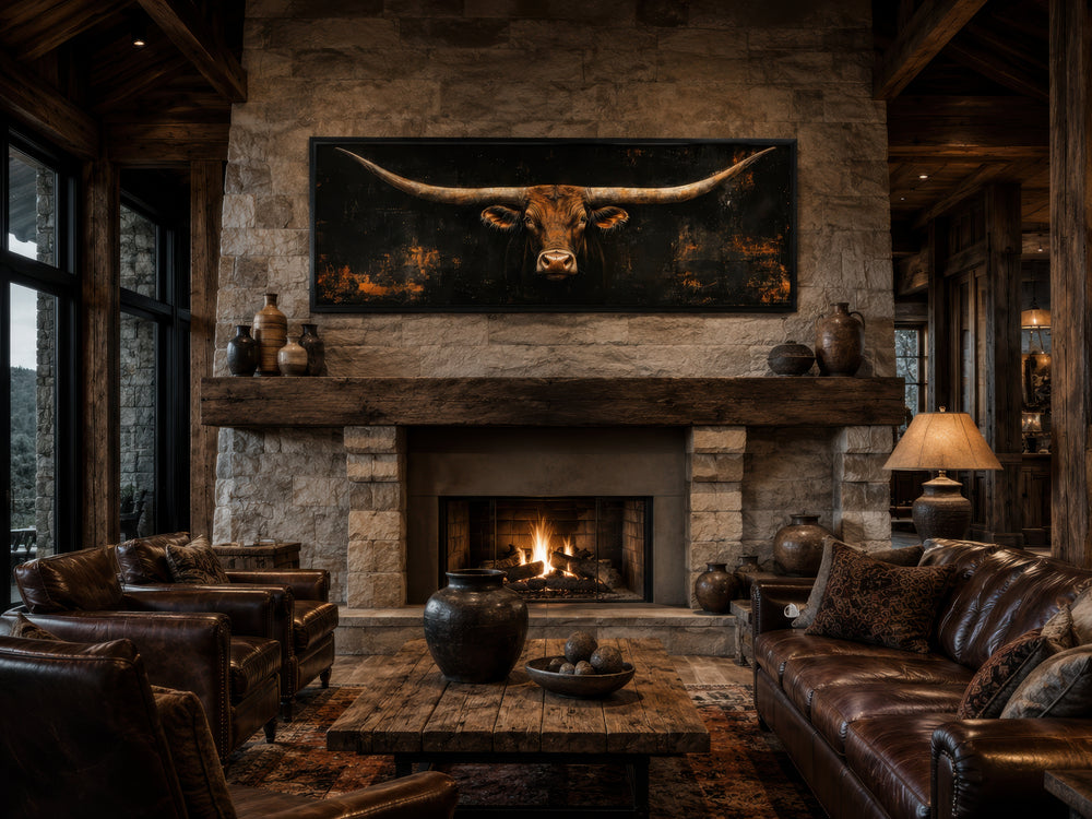 Horizontal Texas longhorn bull head canvas wall art on a black background above a stone fireplace.
