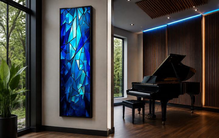 Long narrow navy blue kaleidoscope mosaic abstract vertical framed canvas wall art in a music room.