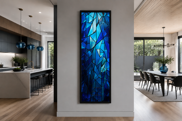 Long narrow vertical framed canvas wall art with navy blue kaleidoscope mosaic abstract design.
