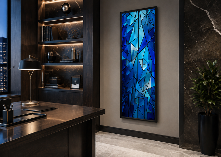 Long narrow vertical framed canvas wall art with navy blue kaleidoscope mosaic abstract design.