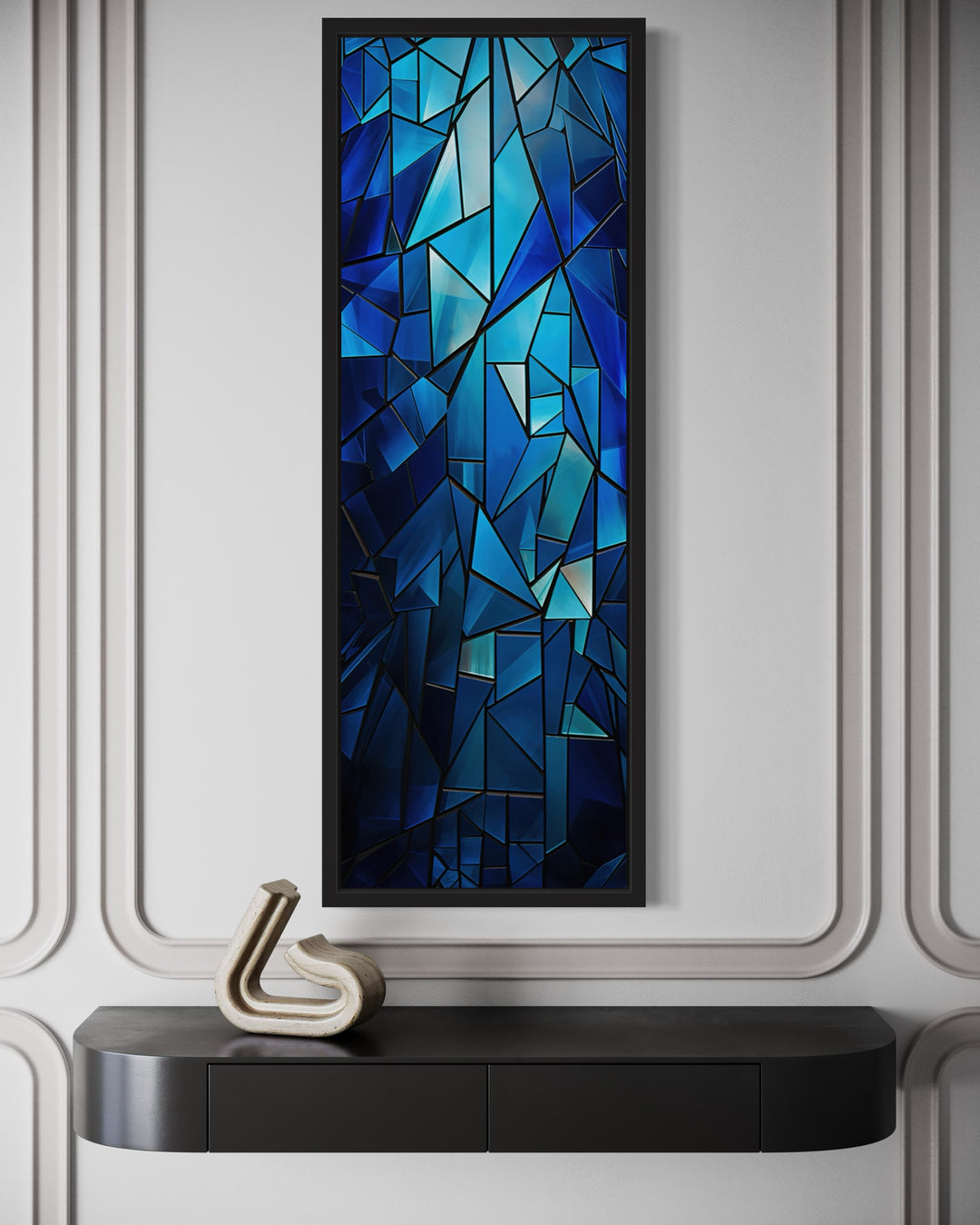 Vertical framed canvas wall art with a navy blue kaleidoscope mosaic abstract design.