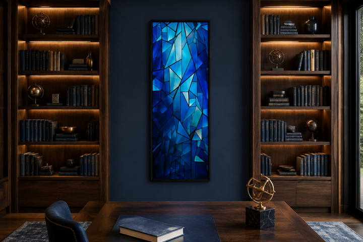 Long narrow navy blue kaleidoscope mosaic abstract vertical framed canvas art in a home office.