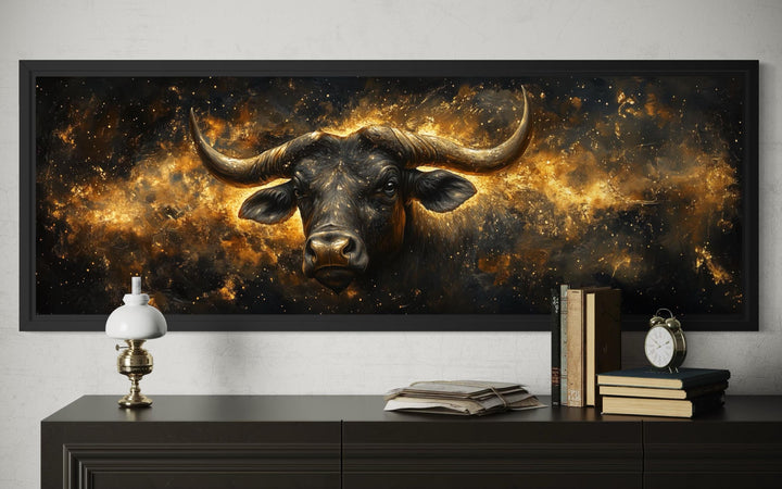 Long narrow black and gold Taurus zodiac bull canvas art.