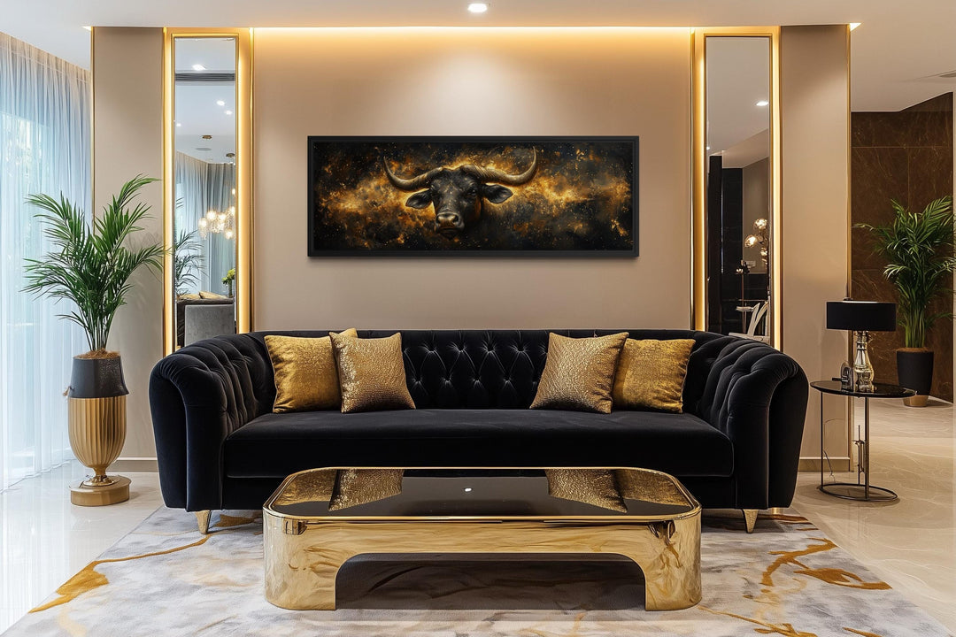 Long horizontal canvas art of a black and gold bull against a celestial background.