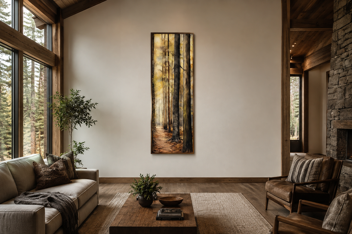 Long narrow vertical framed canvas wall art featuring a watercolor forest scene in a rustic room.