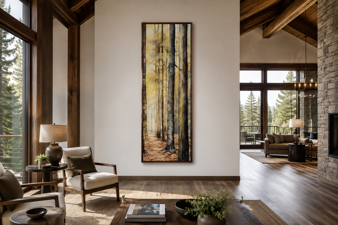 Long narrow vertical framed canvas wall art featuring a watercolor forest scene in a cabin living room