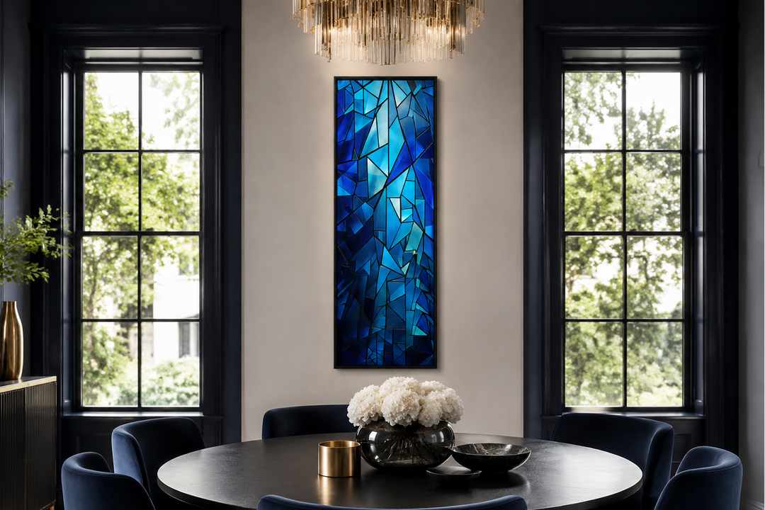 Long narrow navy blue kaleidoscope mosaic abstract vertical framed canvas wall art in a dining room.
