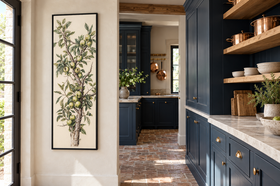 Long vertical framed canvas wall art featuring a botanical apple tree branch in a kitchen setting.