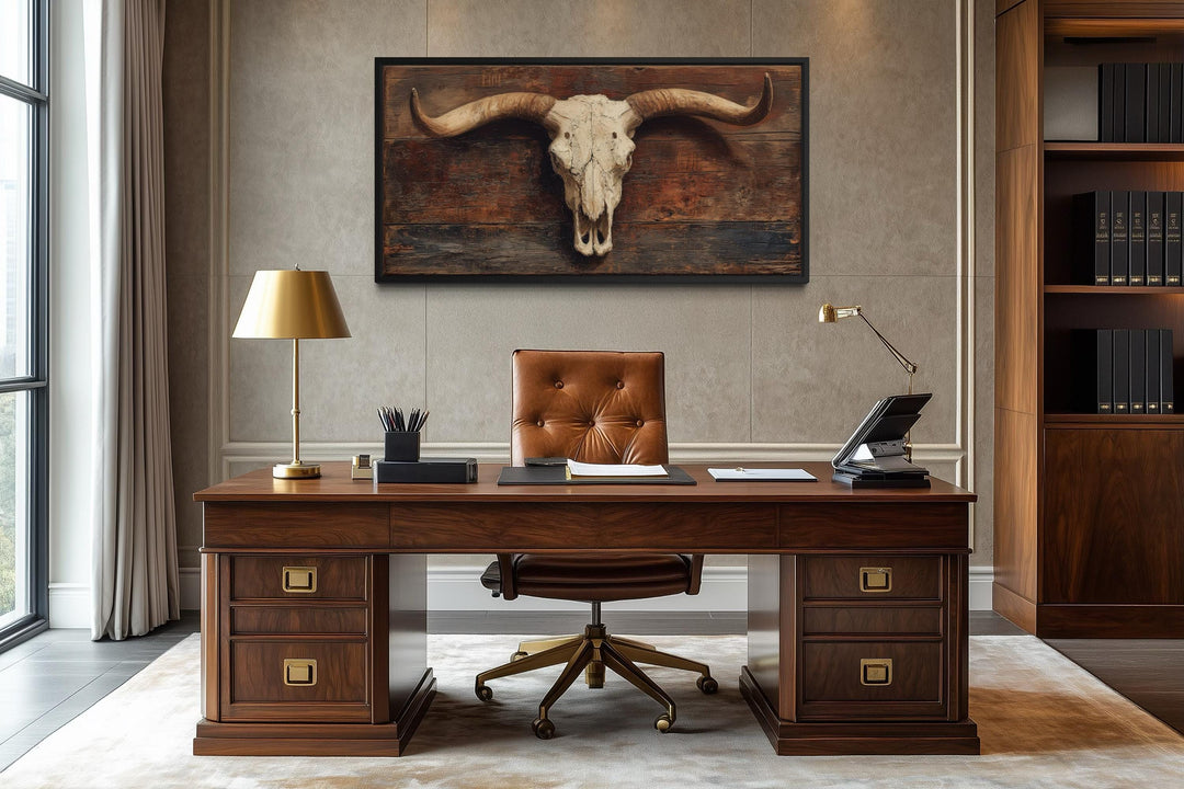 Extra large longhorn skull canvas wall art on a rustic brown background in a modern office setting.