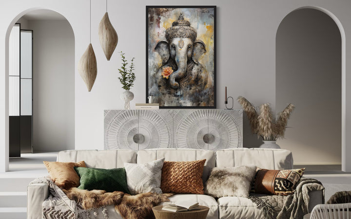 Lord Ganesha modern abstract framed canvas wall art displayed above a white sideboard in a room.