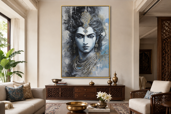 Lord Krishna abstract painting in a gold frame, styled in a modern living room with blue accents.