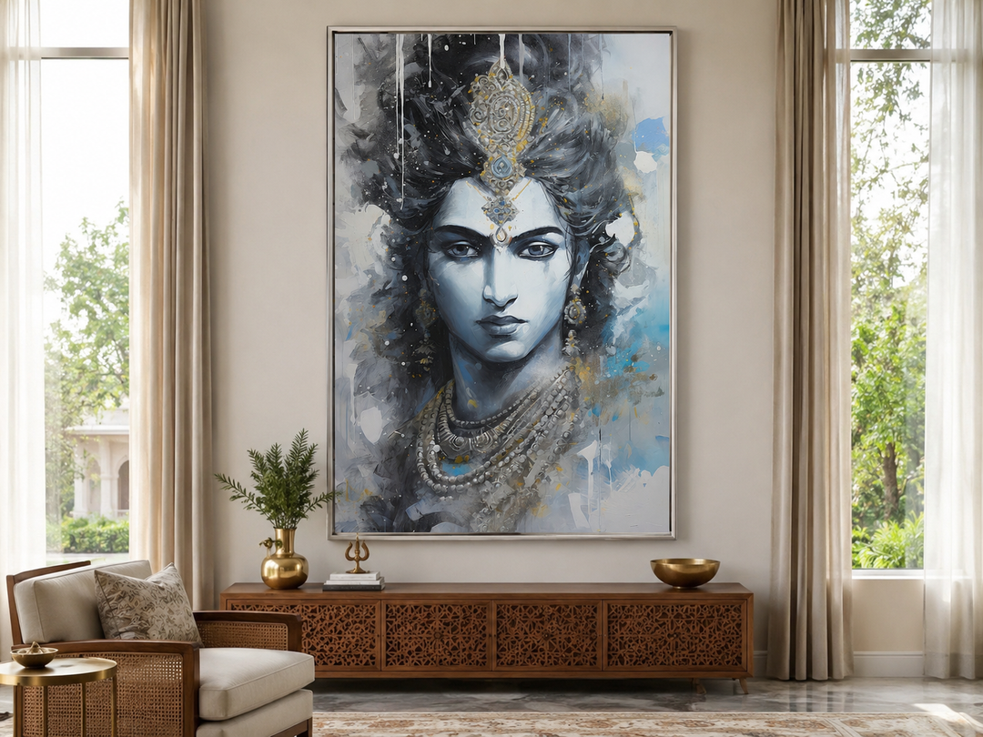 Lord Krishna abstract painting in blue and grey tones, framed on a wall above a wooden console.