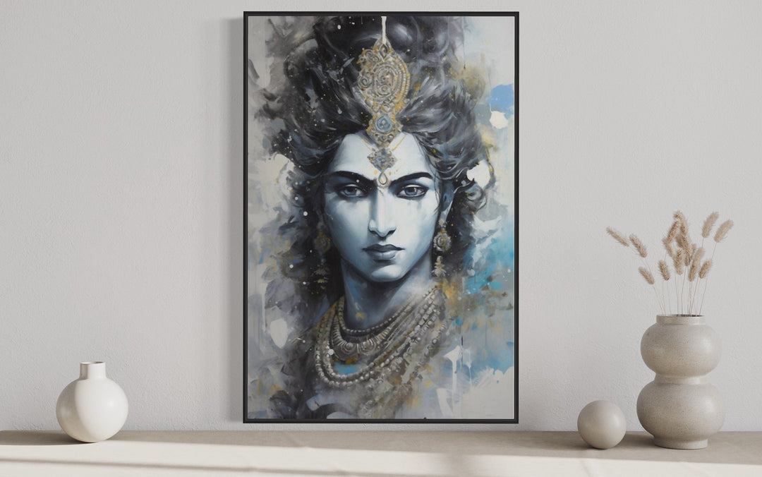 Modern framed canvas wall art featuring an abstract blue-toned painting of Lord Krishna.
