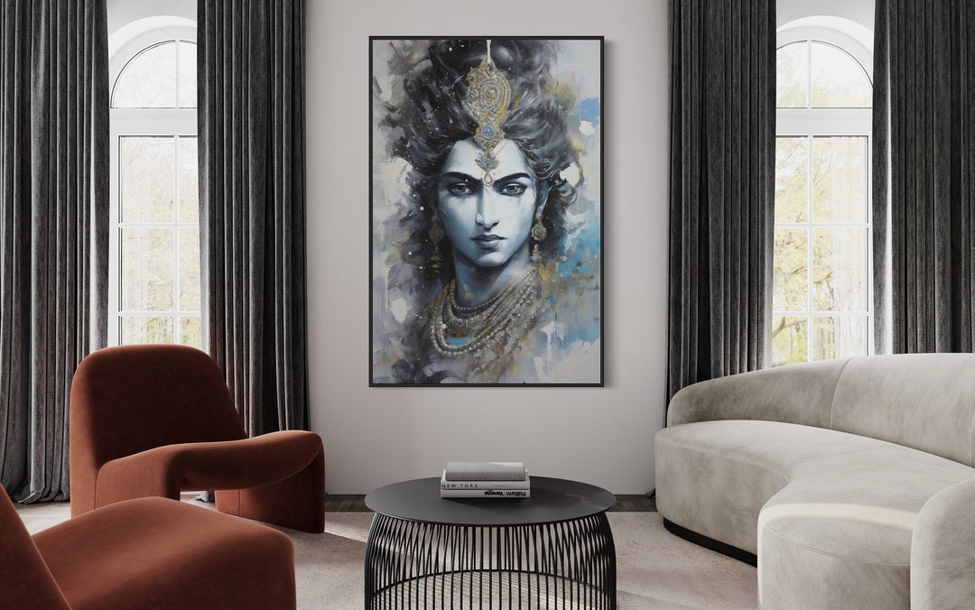 Lord Krishna abstract painting in a black frame, hanging in a modern living room with neutral decor.