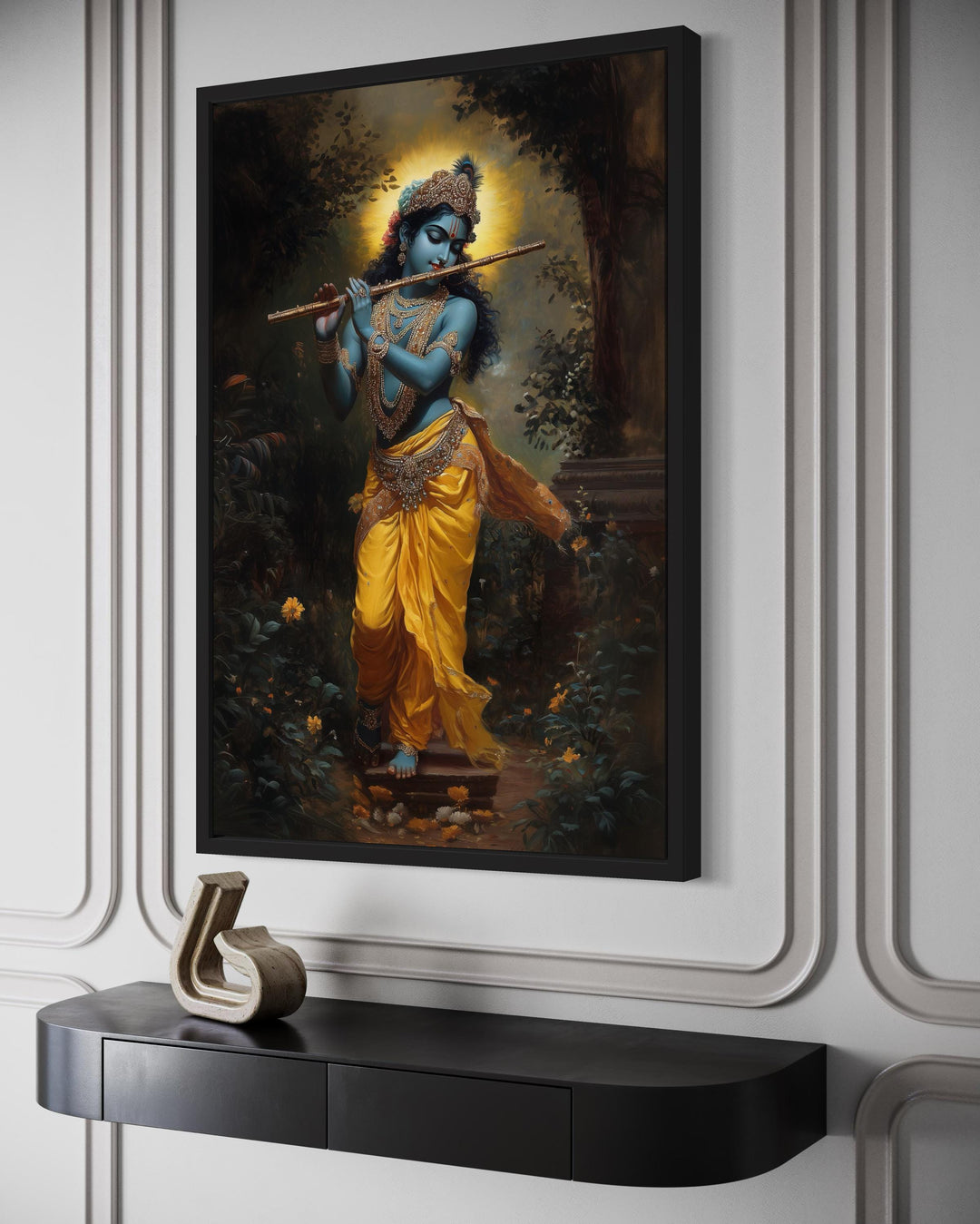 Lord Krishna playing flute in Vrindavan forest framed canvas wall art above a black console table.