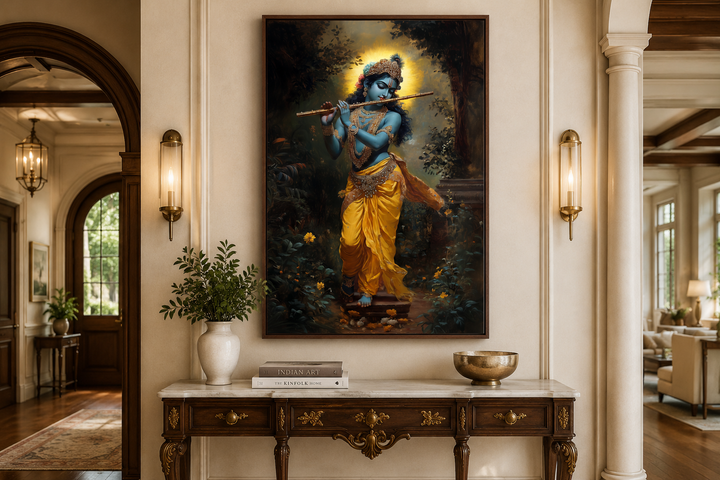 Framed canvas wall art of Lord Krishna playing a flute in a forest, displayed above a console table.