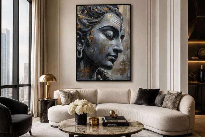 Lord Shiva abstract painting in a black frame, hanging above a curved sofa in a modern living room.