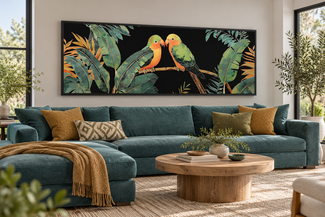 Lovebirds in tropical rainforest long horizontal framed canvas wall art above a teal sectional sofa.