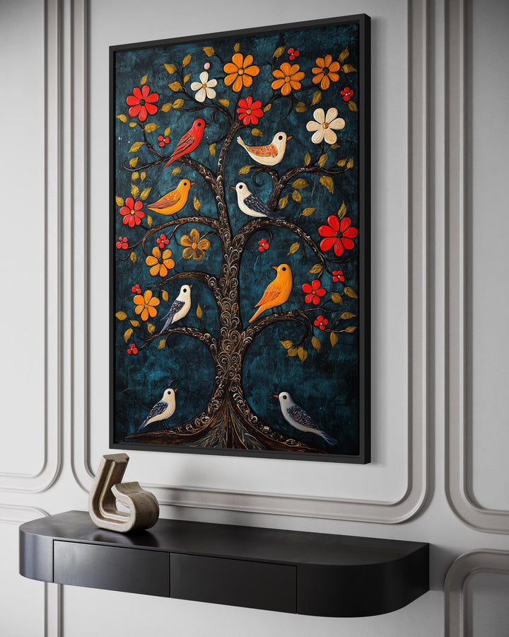 Madhubani birds in the tree wall art canvas print with a blue background on a white paneled wall.