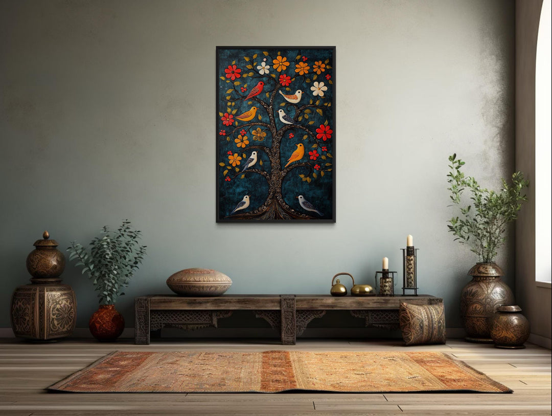 Madhubani birds in the tree wall art canvas print with a blue background in a global-style room.