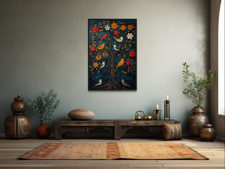 Madhubani birds in the tree wall art canvas print with a blue background in a global-style room.