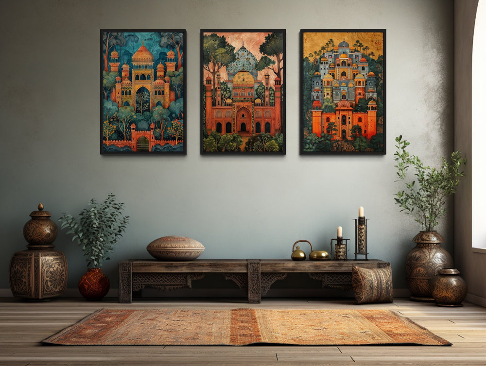 Three framed Madhubani paintings of Mughal architecture and temples.
