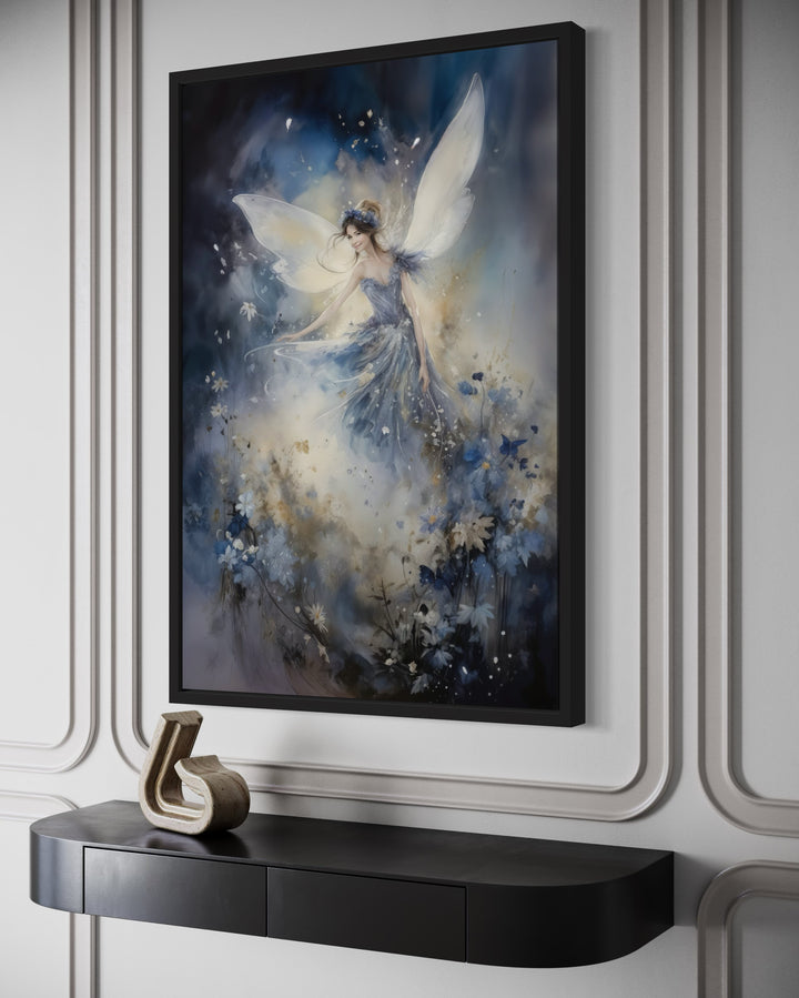 Framed wall art of a magical fairy with wings dancing among blue flowers in an enchanted forest.