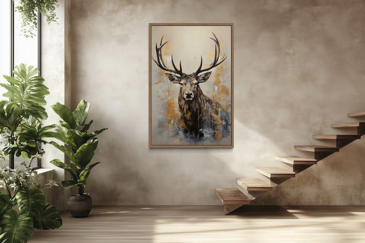 Majestic abstract elk portrait in beige, gold, and gray framed canvas wall art in a modern room.