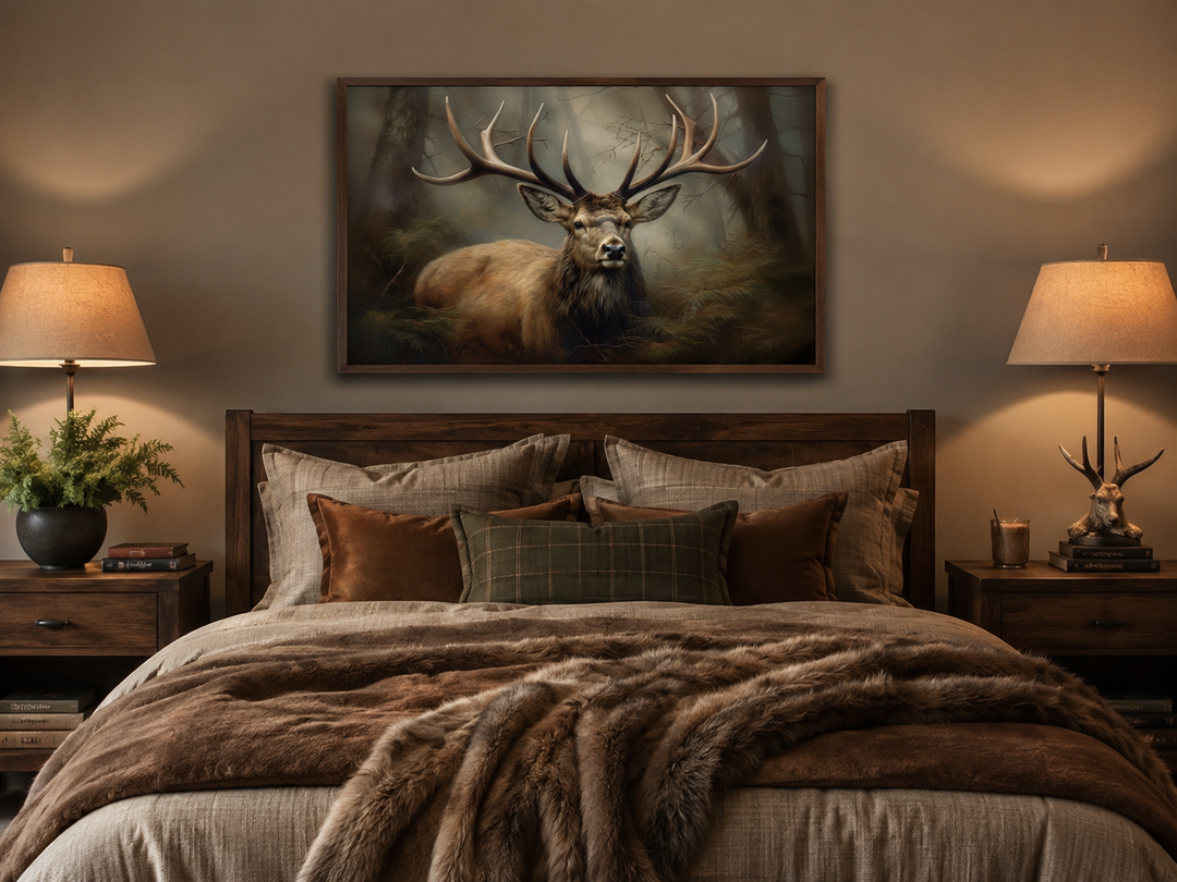 Majestic deer in foggy forest framed canvas wall art hanging above a bed in a rustic cabin bedroom.