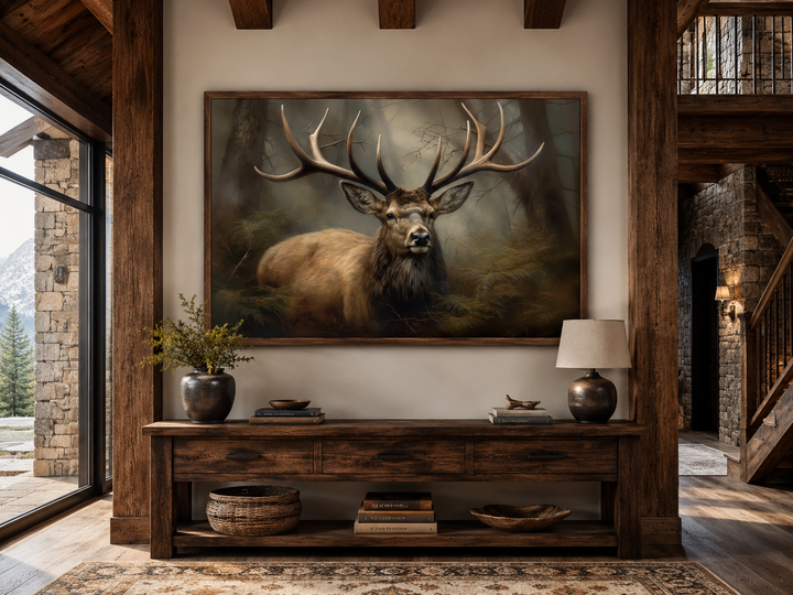 Majestic deer in foggy forest framed canvas wall art displayed above a rustic wooden console table.