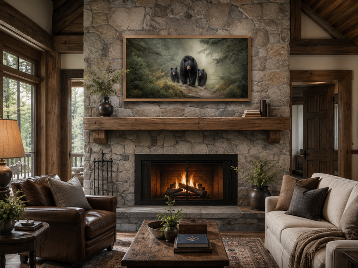 Mama bear and two cubs in a misty pine forest canvas wall art above a rustic stone fireplace.