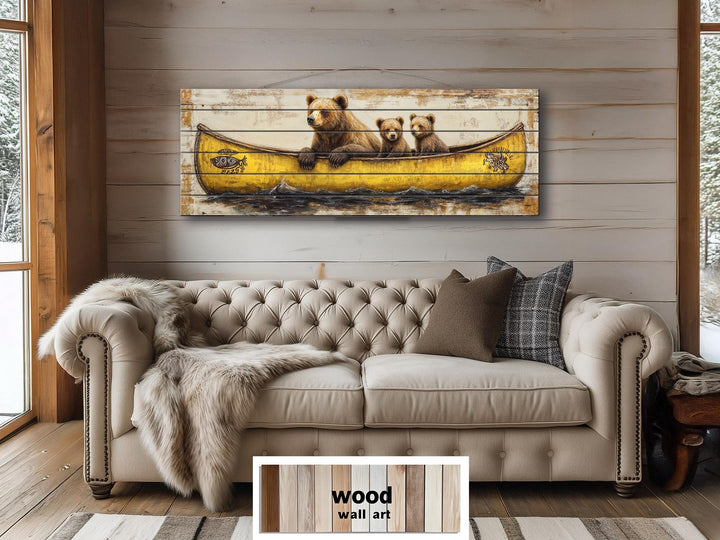 Large horizontal wood wall art featuring a mama bear and two cubs in a yellow canoe.