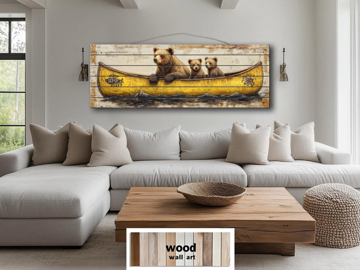 Large horizontal wood wall art featuring a mama bear and two cubs in a yellow canoe.