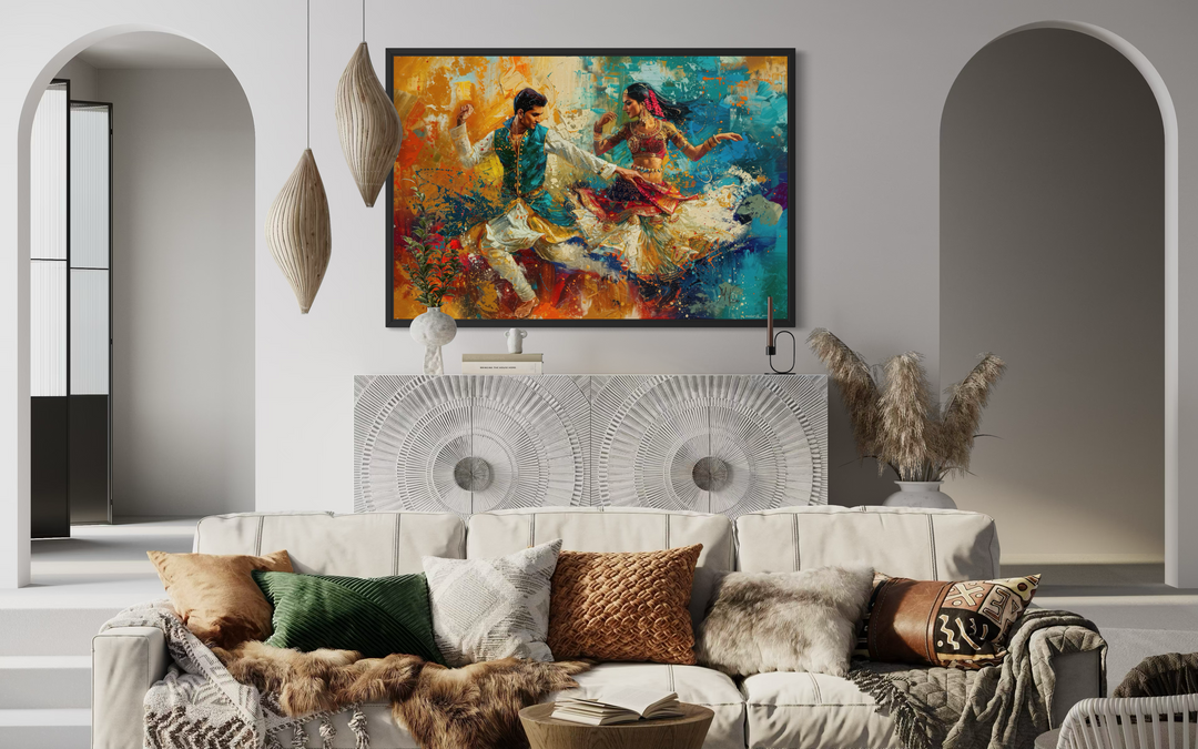 Framed canvas wall art of a man and woman in traditional attire dancing in a vibrant Bollywood style.