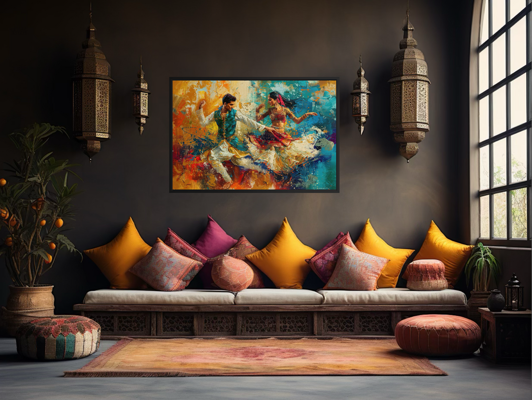 Framed canvas wall art of a man and woman dancing in vibrant Bollywood style on a dark wall.