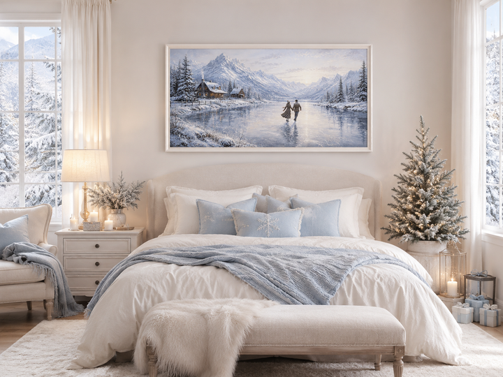 Framed canvas art of a man and woman skating on a frozen lake with snow-capped mountains behind.