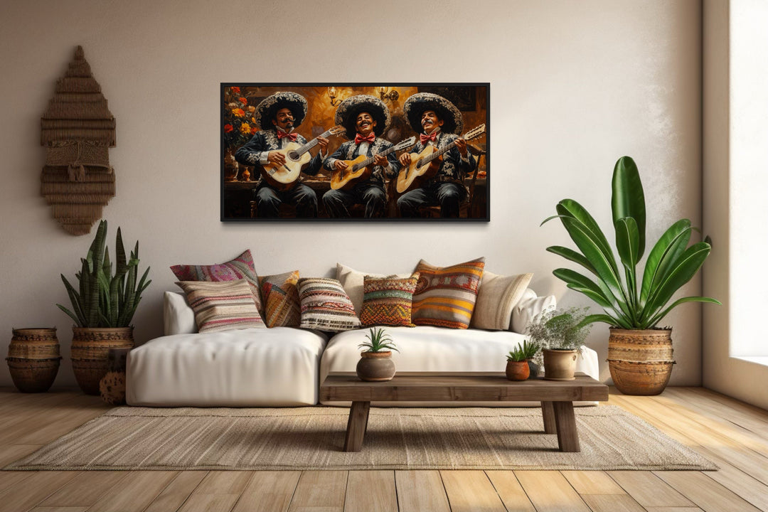 Extra large framed canvas print of a mariachi band performing, hung above a white sofa.